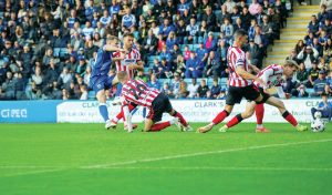 Gillingham’s Elliott Nevitt rescues a late point for his side