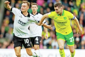 Bristol City’s Scott Twine tries to wriggle away from Norwich’s Kenny McLean