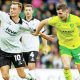 Bristol City’s Scott Twine tries to wriggle away from Norwich’s Kenny McLean