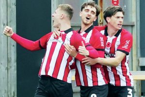 Lincoln City’s Rob Street celebrates putting the Imps in front