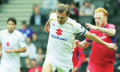 MK Dons skipper Alex Gilbey has belief his side can challenge for promotion