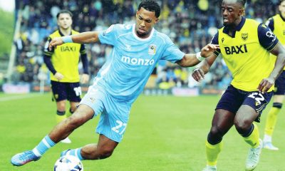 Coventry City’s Milan van Ewijk takes on Oxford United’s Greg Leigh