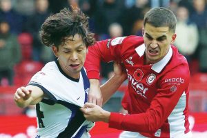 Birmingham’s Tomoki Iwata grapples with Bristol City’s Anis Mehmeti
