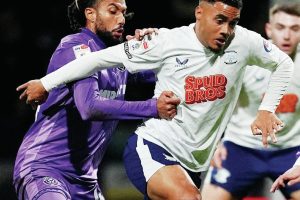 Preston North End’s Lewis Dobbin tries to escape Sheffield United’s Jairo Riedewald
