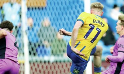 Mansfield Town’s Will Evans fires in the opening goal to make it 1-0