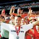 Ian Evatt celebrates with elated Blackpool fans after winning promotion to the Premier League in 2010