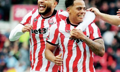 Million Manhoef, right, celebrates scoring Stoke City’s third with Lewis Baker