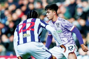 Wednesday’s Harry Amass on the ball