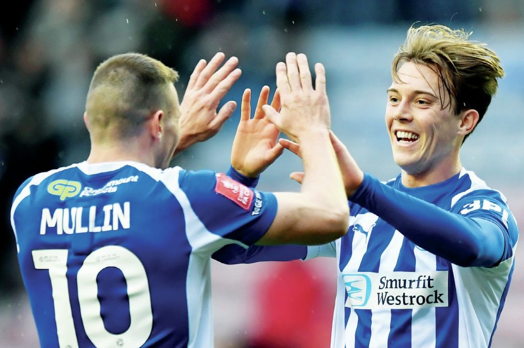 Wigan Athletic’s Callum Wright celebrates his goal with Paul Mullin