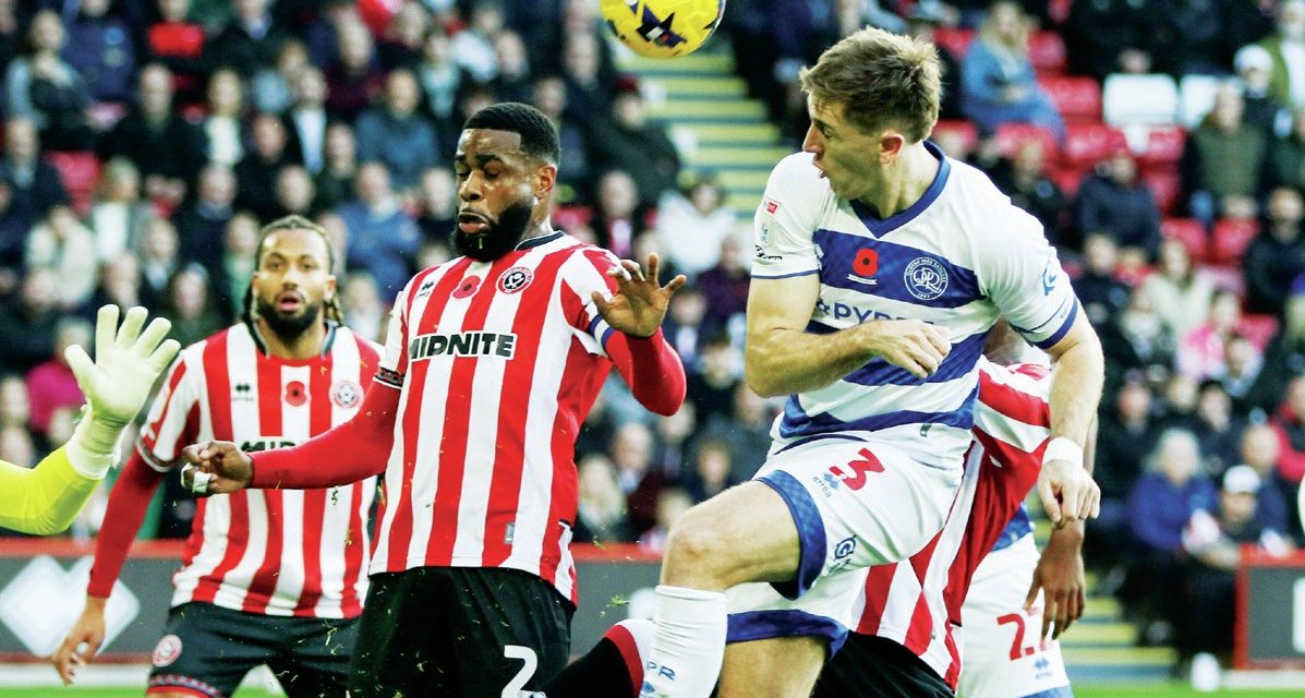 Queens Park Rangers defender Jimmy Dunne heads the ball for goal