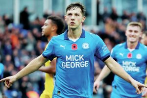 Peterborough United’s Harry Leonard celebrates scoring from the spot to make it 2-0 early on