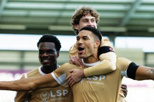Omar Sowunmi celebrates with his team-mates after scoring Bromley’s opener