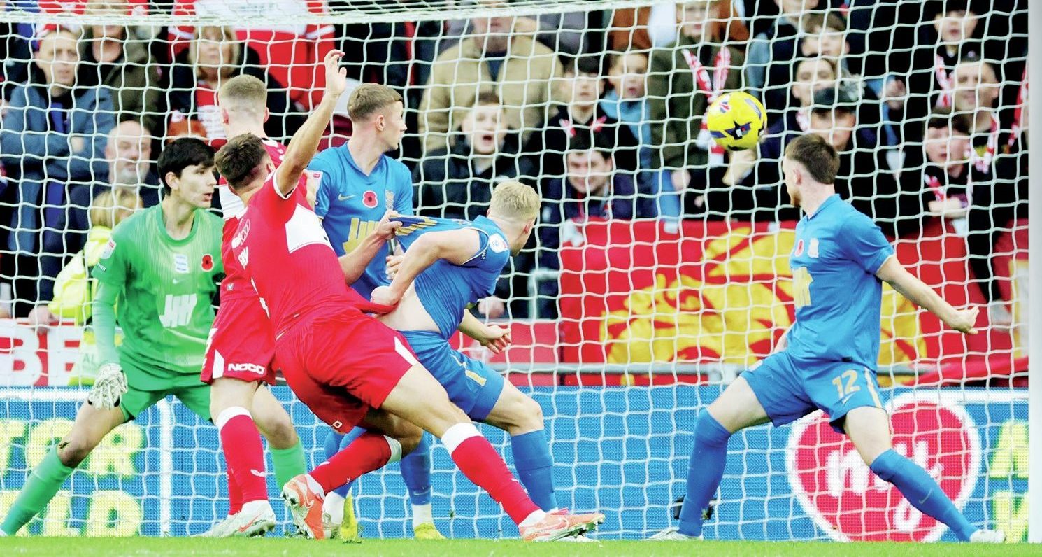 Middlesbrough’s Dael Fry, second left, scores the opener