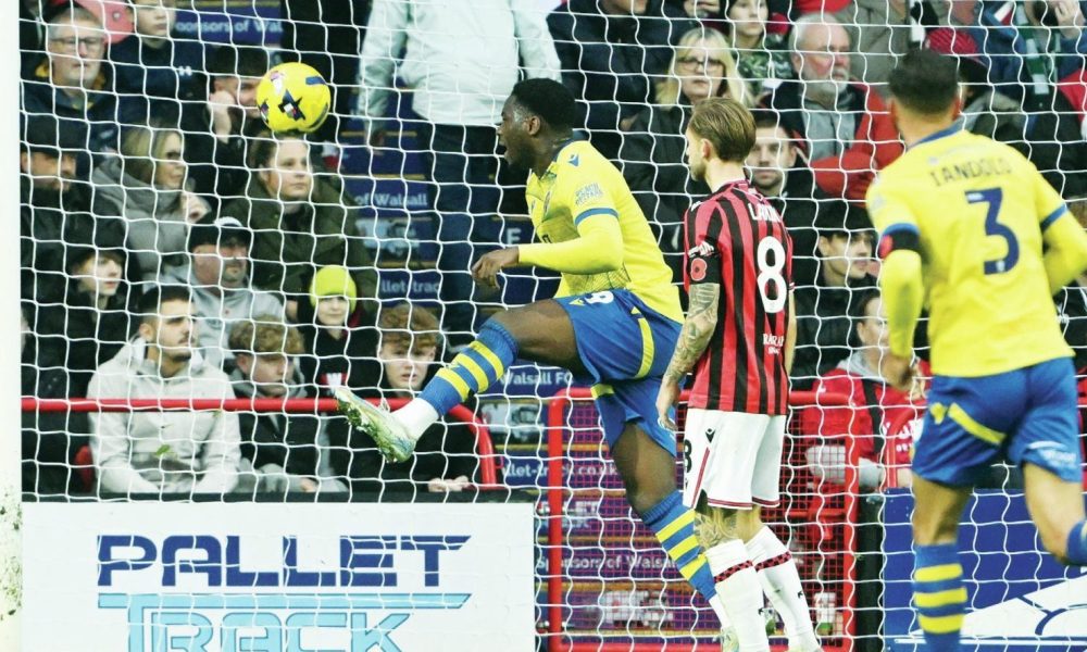 Colchester United’s Samson Tovide scores the opening goal