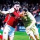 Fleetwood’s Harrison Holgate, left, and Swindon’s Billy Bodin fight it out