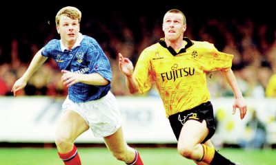 ambridge United’s Steve Claridge, right, and Portsmouth’s Andy Awford