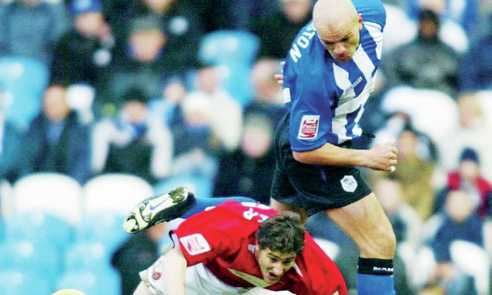 Guy Branston in typically robust action for Sheffield Wednesday against Hartlepool in 2004