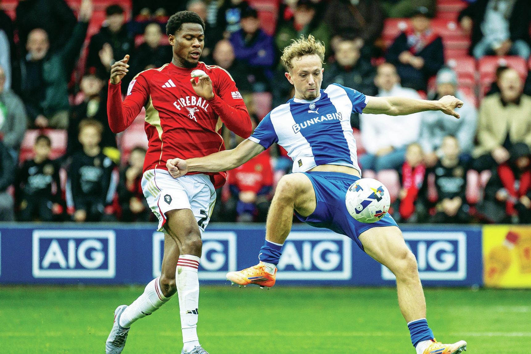 Michael Mellon is happy to play under dad Micky at Oldham Athletic