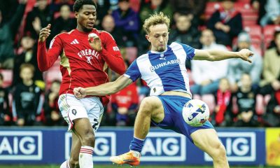 Michael Mellon is happy to play under dad Micky at Oldham Athletic