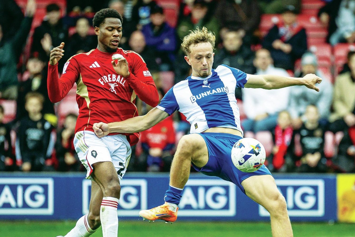 Michael Mellon is happy to play under dad Micky at Oldham Athletic