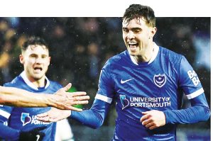 Zak Swanson, right, celebrates his wonder goal for Pompey.