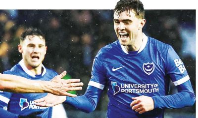 Zak Swanson, right, celebrates his wonder goal for Pompey.