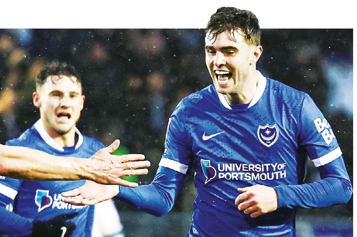 Zak Swanson, right, celebrates his wonder goal for Pompey.