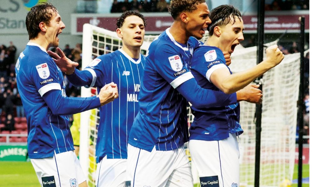 Joel Colwill celebrates with team mates after scoring for Cardiff City