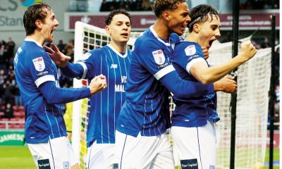 Joel Colwill celebrates with team mates after scoring for Cardiff City