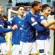 Joel Colwill celebrates with team mates after scoring for Cardiff City