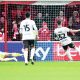 Grimsby Town’s Danny Rose sends Swindon Town goalkeeper Connor Ripley the wrong way from the penalty spot to level it up