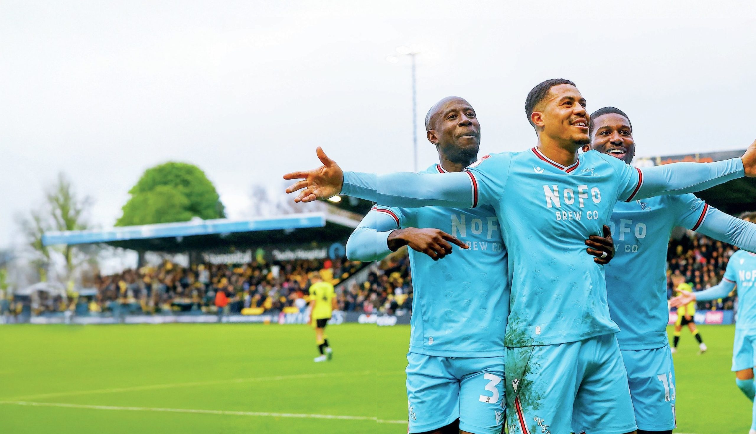 Walsall’s Priestley Farquharson celebrates his goal with team-mates