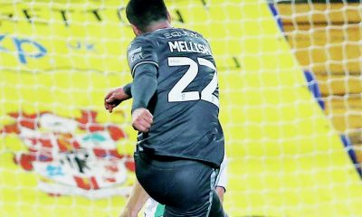 Milton Keynes Dons’ Jon Mellish fires in their first goal to reduce the deficit