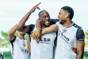 Nicke Kabamba, left, celebrates scoring for Bromley