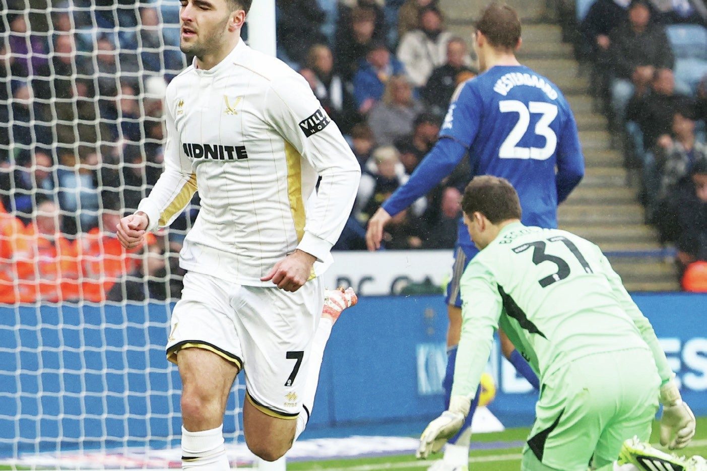Tom Cannon (7) celebrates opening the scoring