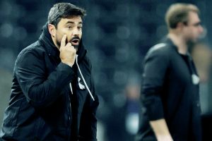 Vitor Matos on his Swansea bow against Derby in midweek and, below, at his Swans unveiling