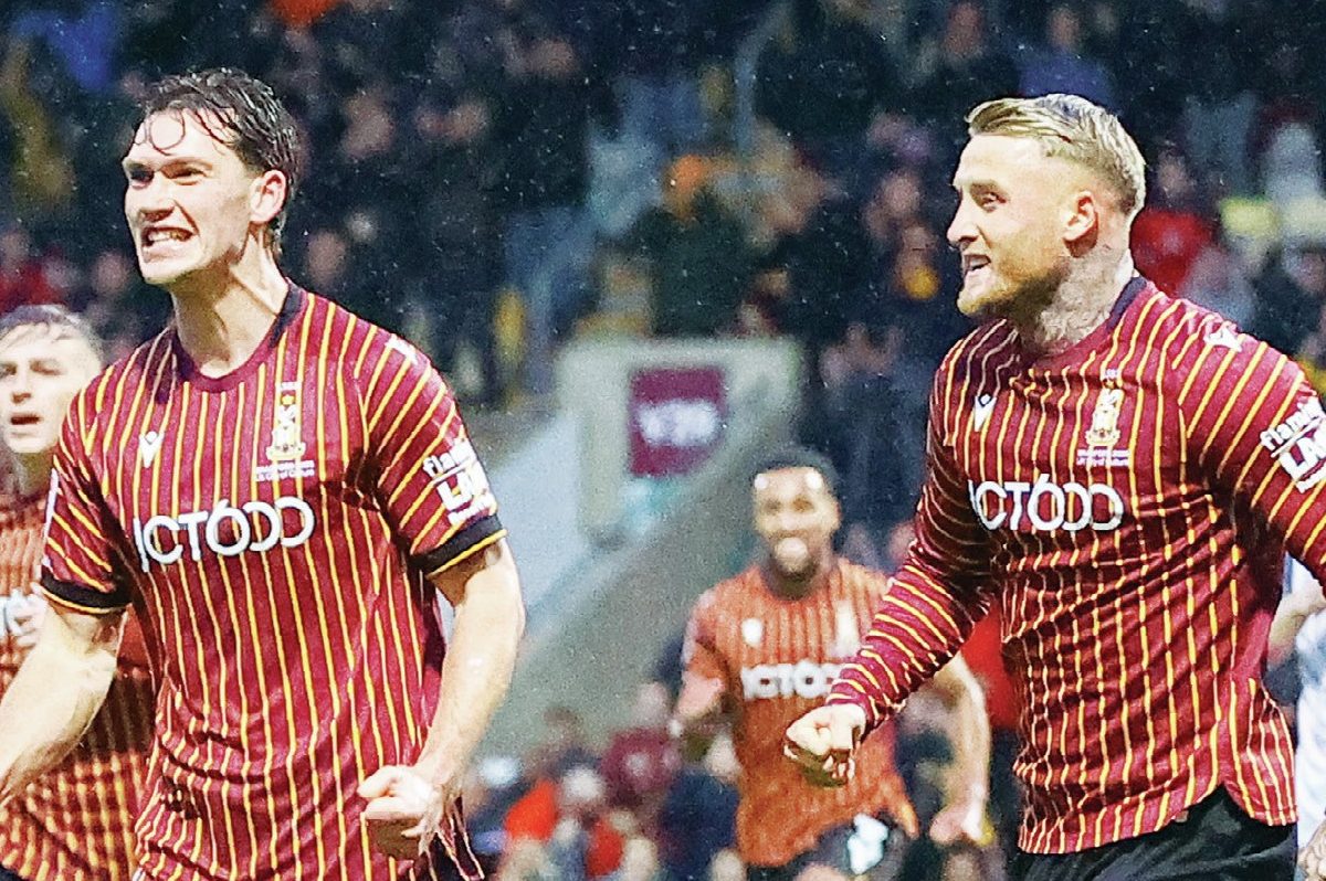 Bradford City’s Joe Wright, left, enjoys his goal with Stephen Humphrys