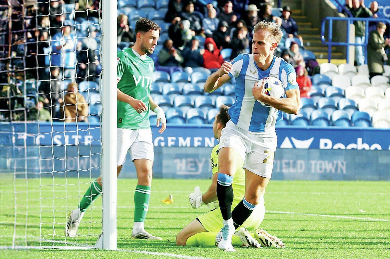 Bojan Radulovic heads home for the Terriers against Stockport County