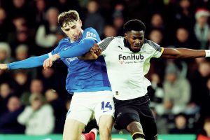 Portsmouth’s Hayden Matthews, left, and Derby’s Patrick Agyemang tussle