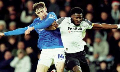 Portsmouth’s Hayden Matthews, left, and Derby’s Patrick Agyemang tussle