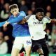 Portsmouth’s Hayden Matthews, left, and Derby’s Patrick Agyemang tussle