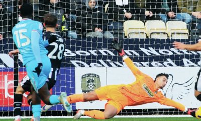 Notts County keeper Kelle Roos saves well from Daniel Kanu