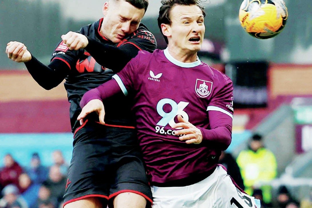Millwall’s Macaulay Langstaff heads at goal