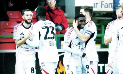 Salford City’s Kelly N’Mai, third from left, celebrates scoring their second