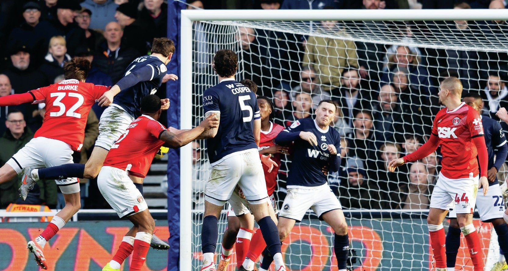 Caleb Taylor heads home Millwall’s second goal against Charlton Athletic