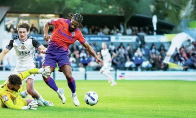 Gillingham’s Garath McCleary earns a penalty against Bromley