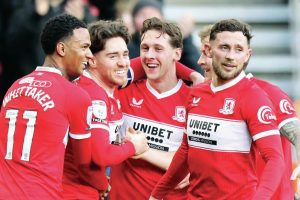 Middlesbrough’s Hayden Hackney, second left, takes the congratulations