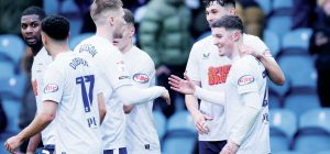 Preston North End’s Alfie Devine, right, celebrates with team-mates after scoring their goal