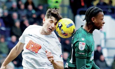 Preston North End’s Jordan Storey wins his header