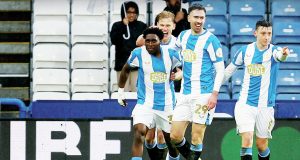 Ryan Hardie celebrates his Huddersfield Town winner with team-mates
